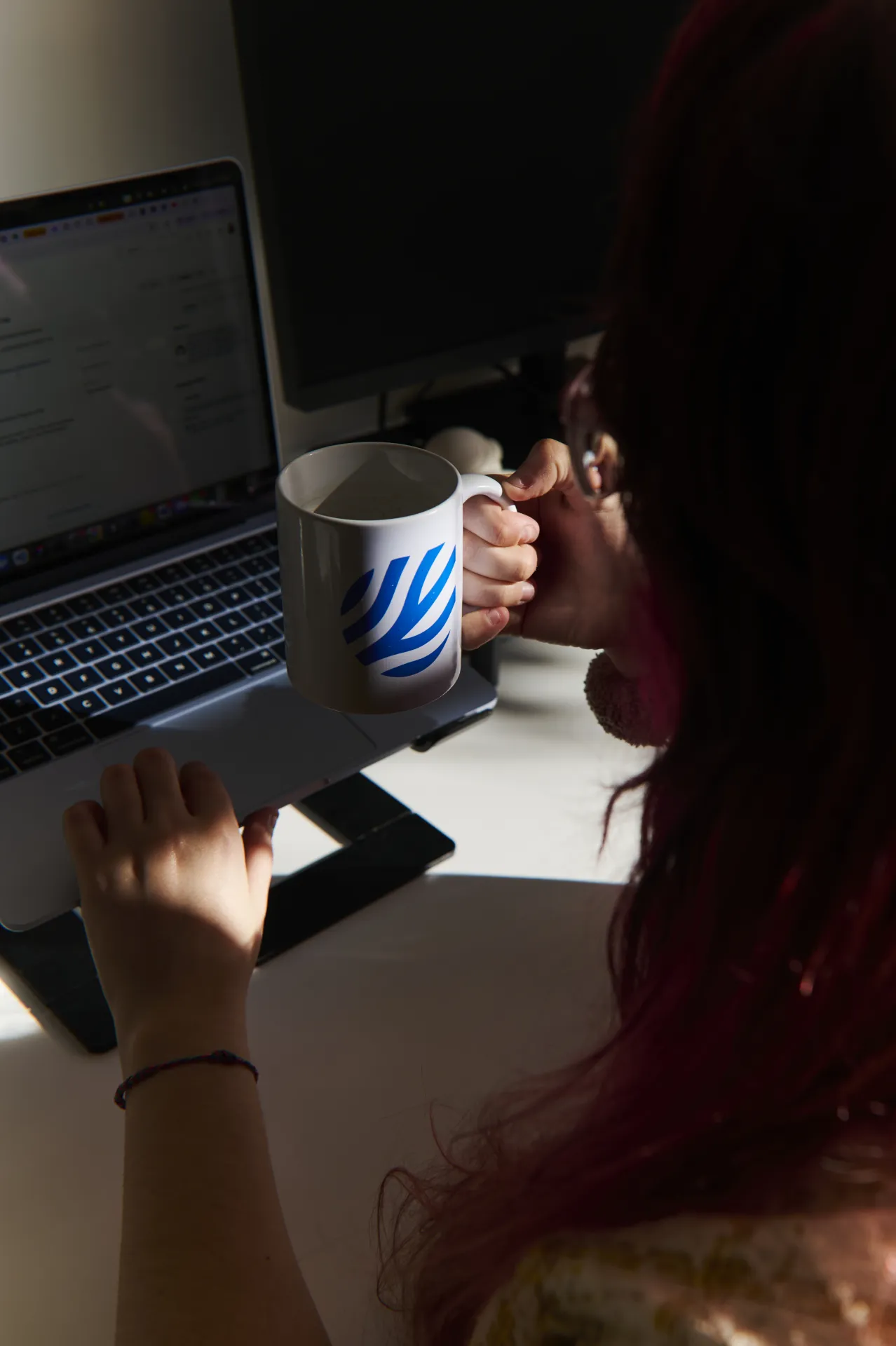 Pento team member working with coffee